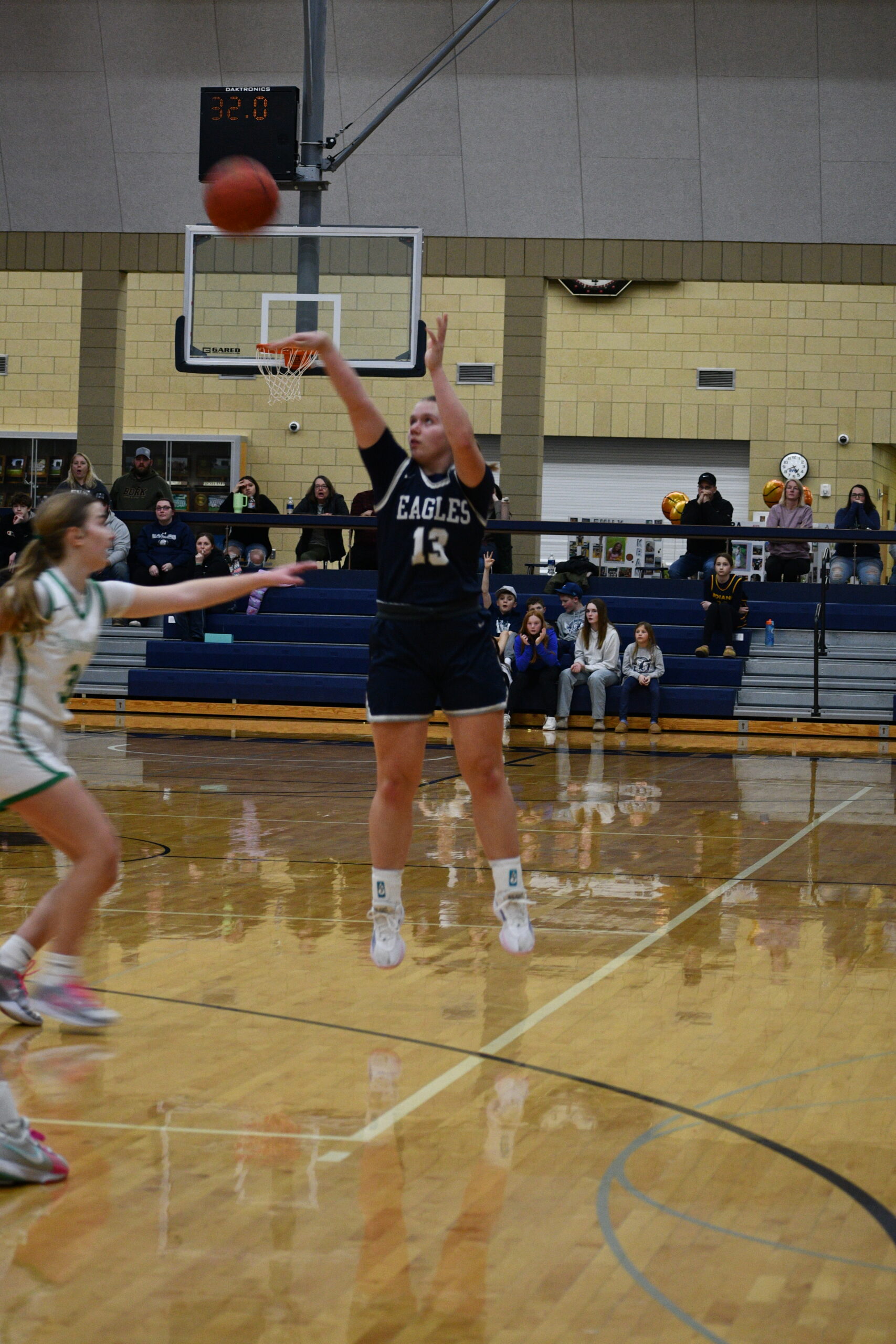 Eagle girls end regular season with loss, drop playoff opener